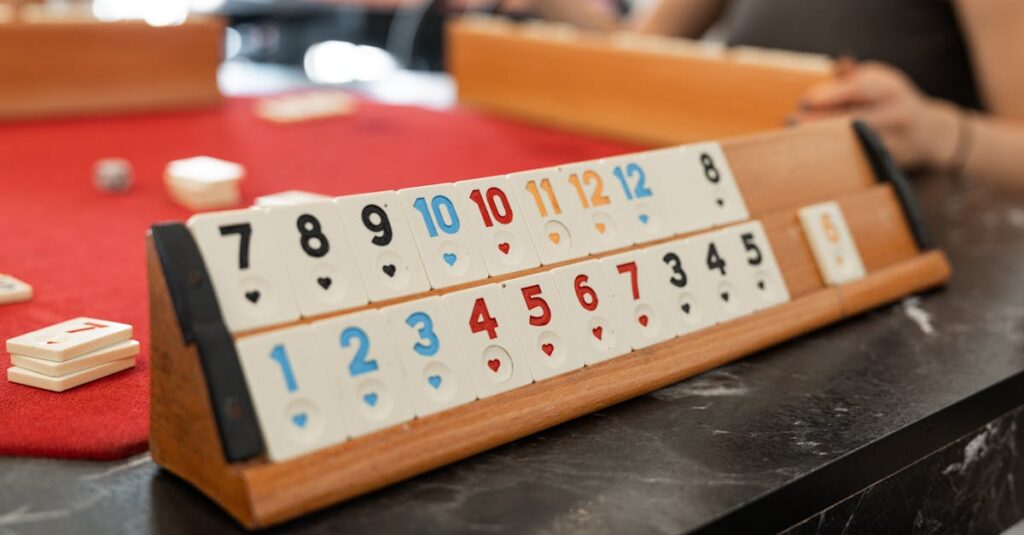 ボードゲームの比較表を見ながら選ぶ家族。年齢や人数に合ったゲームを検討している。