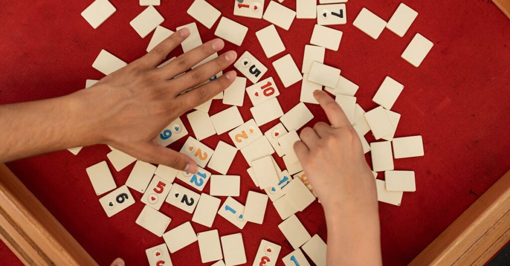 冬休みに家族でカードラインを遊ぶシーン。子どもも大人も笑顔でカードを並べている。