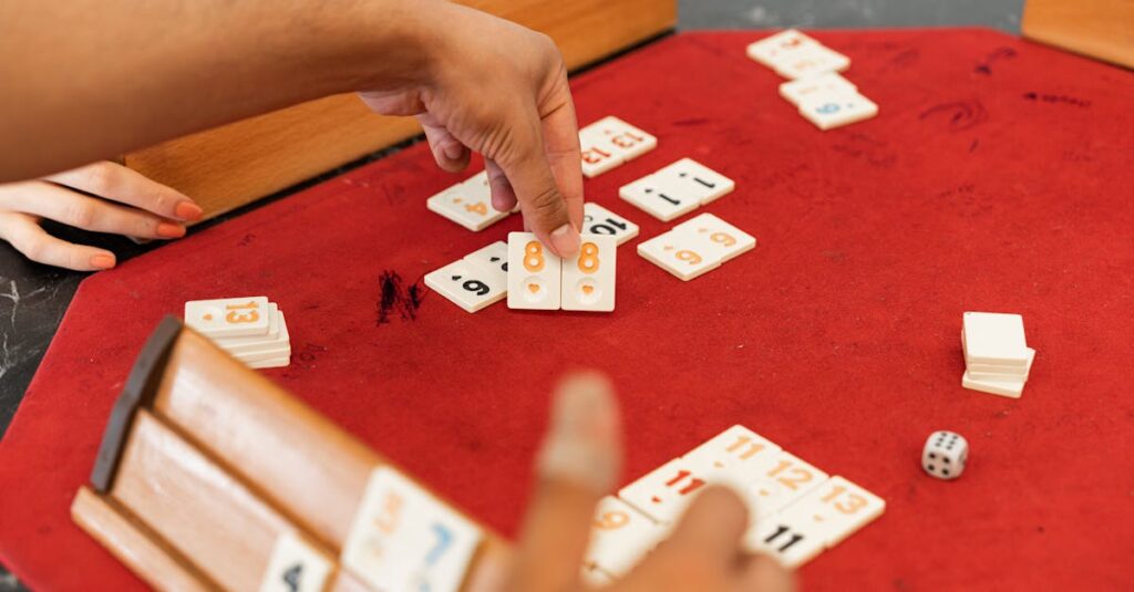 初心者たちがボードゲーム中に大笑いしている瞬間。勝ち負け以上に楽しさが伝わる場面。