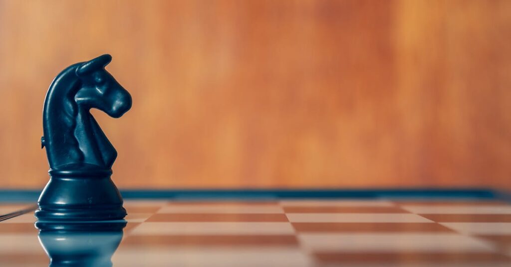 ボードゲームで負けて泣いてしまった子どもを優しくフォローする家族の様子