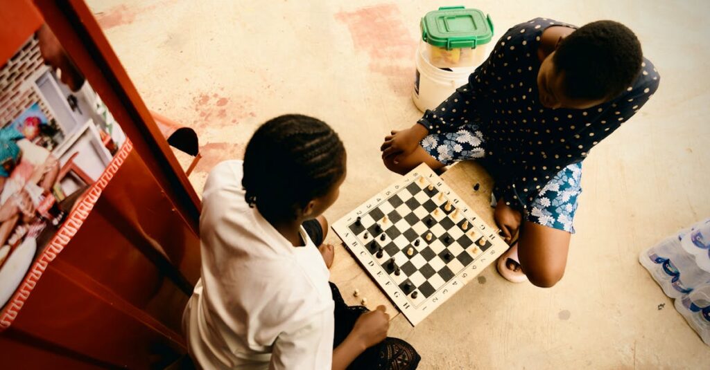 中高生と大人が戦略的なボードゲームで真剣勝負。知的な駆け引きが楽しい時間。