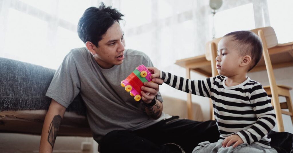 幼児向けのカラフルなボードゲームで遊ぶ親子の様子